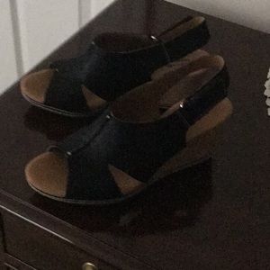 Black suede and cork wedge sandals.